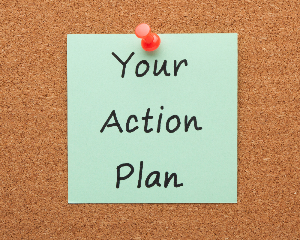 Your action plan written on a post-it note on a corkboard.