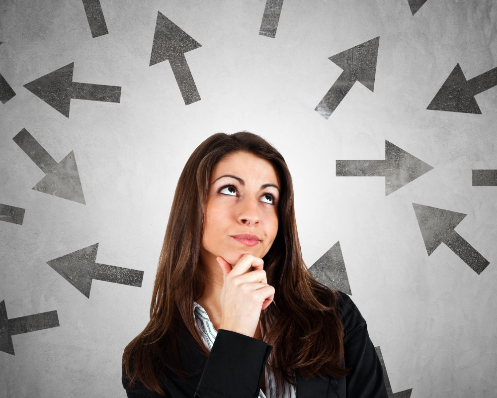 Female allied health professional  thinking about which direction to go