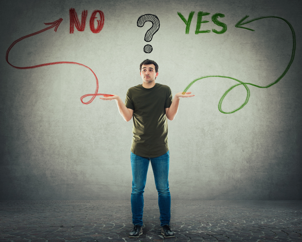 A man standing between red “No” and green “Yes” arrows, symbolizing the confusion caused by no-win, no-fee recruitment versus strategic hiring.
