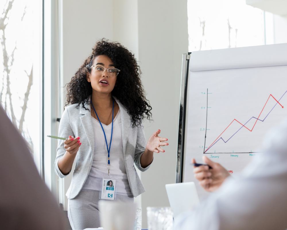 Female medical sales rep presenting to a group