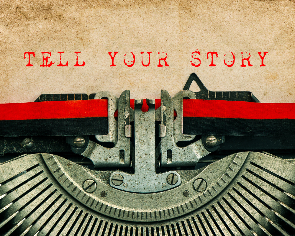Vintage typewriter with the words ‘Tell Your Story’ typed on paper, symbolizing personal branding and LinkedIn profile storytelling.
