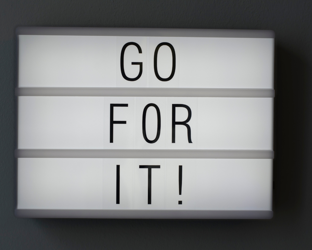 Illuminated lightbox with “Go for it!” message – encouraging bold career moves and decision-making in MedTech recruitment.