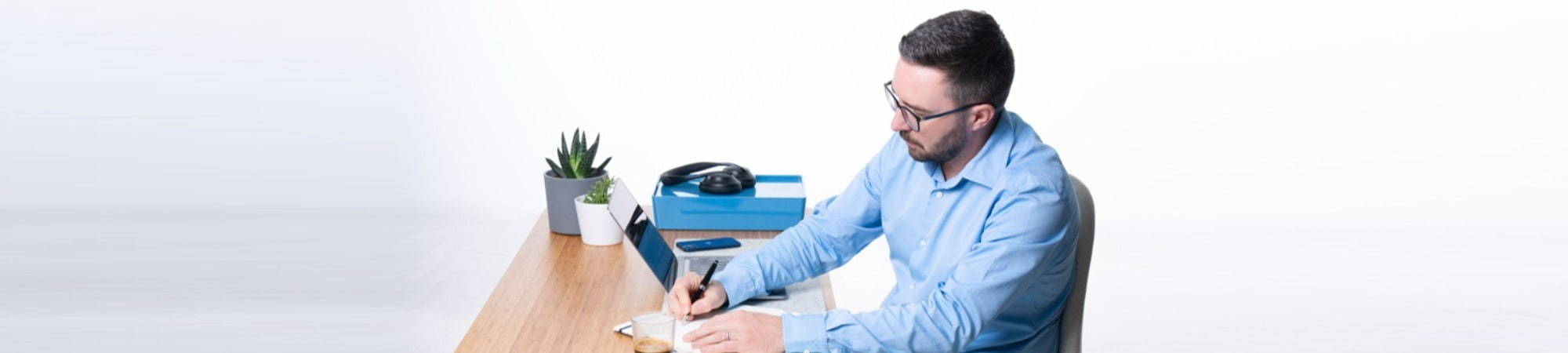 Recruitment consultant writing a blog at a desk